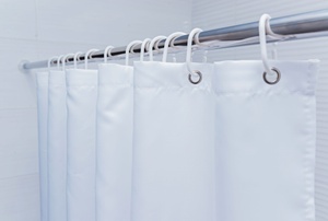 A white shower curtain.