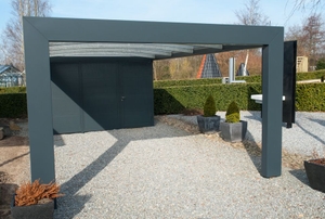 A two-story home with an attached carport.