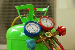 A green Freon gas tank.