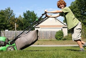 Boy Mowing Lawn