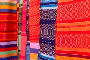 bright colorful berber carpets hanging together