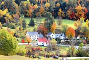a new england town with fall foliage