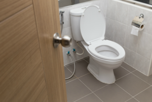 A toilet in a small room.