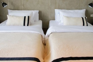 two twin beds next to each other