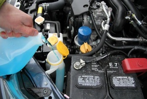 Windshield Washer fluid being poured