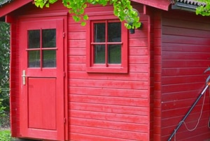 red painted garden shed