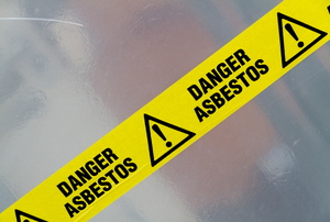 A sign that says "Danger Asbestos."