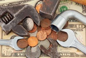 Pile of tools and money