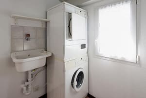 A stackable washer dryer.
