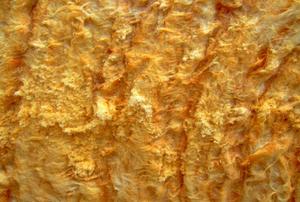 A close-up of yellow insulation.