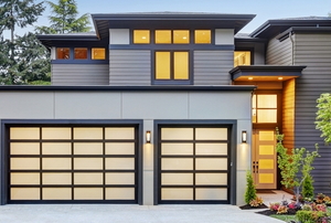 tall home with Japanese style garage doors