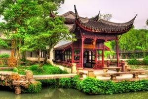 beautiful pagoda in park with large pond