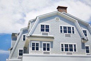 A home with a gambrel roof.