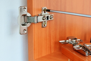screwdriver fixing cabinet hinges