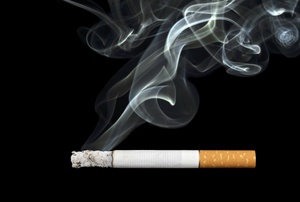 Smoke billowing up from a cigarette.