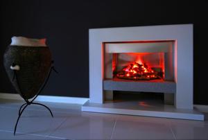 A modern fireplace with a fire going.