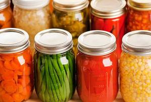 Rows of Fall Harvest Vegetable Food in Home Canning Jars
