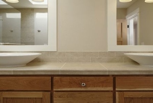 A bathroom with cabinet drawers.