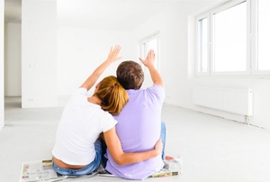 A couple imaging how they're going to design the inside of their new home.
