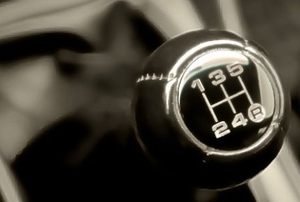 The gear shift of a manual transmission.
