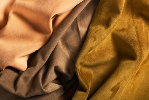 Three colors of brown suede fabrics.