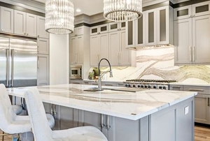 luxury home kitchen with marble island