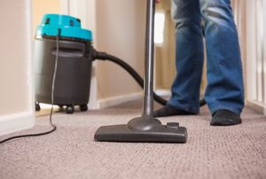 a carpet being vacuumed