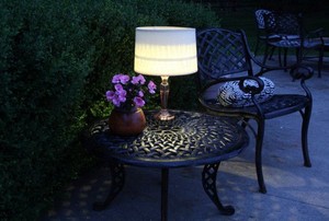 Solar lamp on a bistro set.