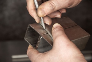 Writing using a scriber