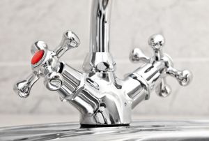 A faucet with cold and hot water.