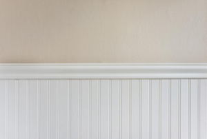 Wainscoting against a beige wall
