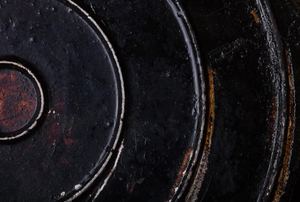 A close-up image of rusted cast iron.