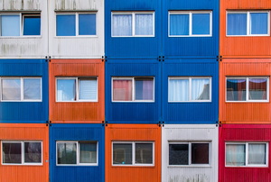 A stack of homes made out of shipping containers. 