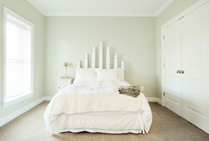 A simple white bedroom.