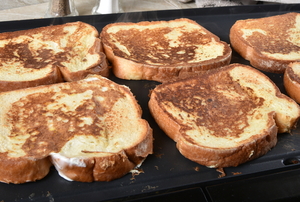 french toast on a stovetop griddle