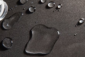 water pooling on a waterproof concrete surface