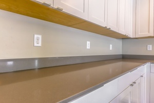 Cabinets with catch hardware.