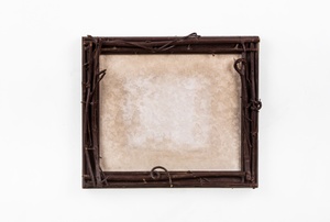 A picture frame on a wall.
