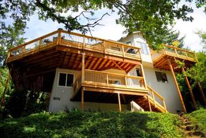 A mega cedar deck in need of winterizing.