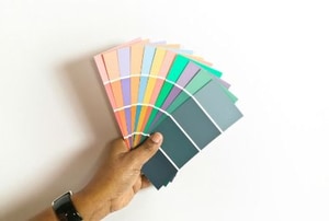 A handful of paint color sample cards.