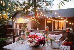 backyard with beautiful lighting and decor