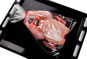 A chicken in an oven bag.