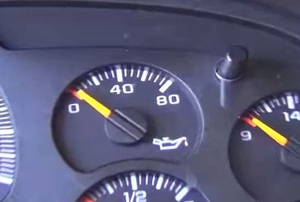 An oil pressure gauge with the needle sitting at zero.