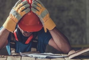 disappointed construction worker made a mistake looking at plans