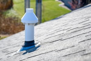 a chimney vent on a roof