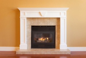 gas fireplace with white mantel
