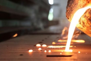 molten metal pouring into molds