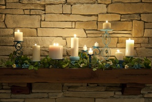 A fireplace with rock veneer.