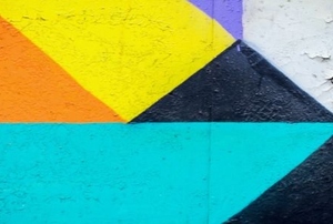 abstract paint in purple, orange, yellow, blue, black, and gray