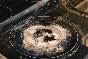 oven stovetop with glass burn stains